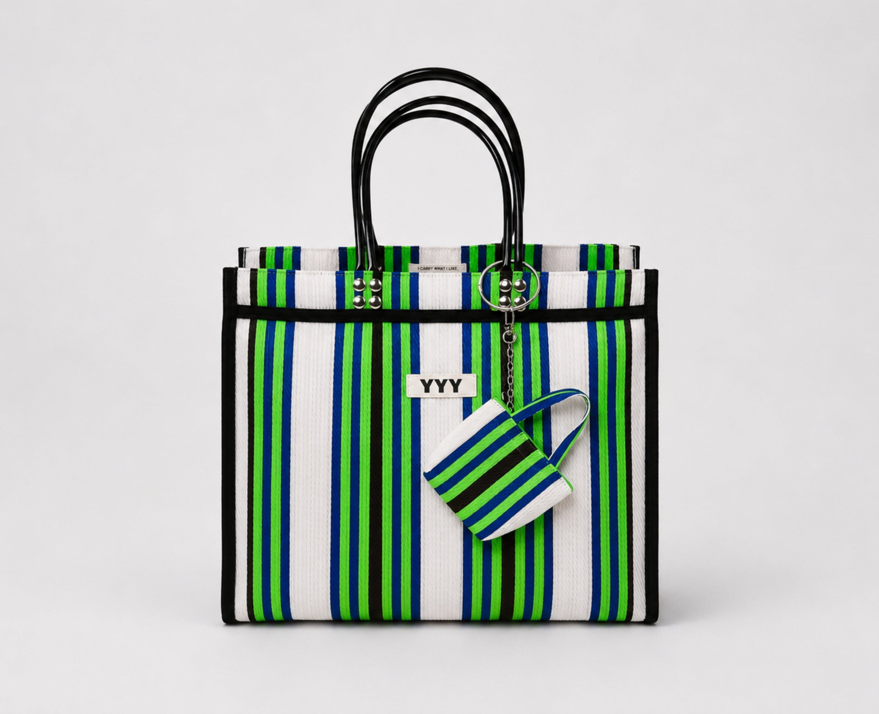 The Tote handmade bag in green and white stripes made from 100% recycled plastic