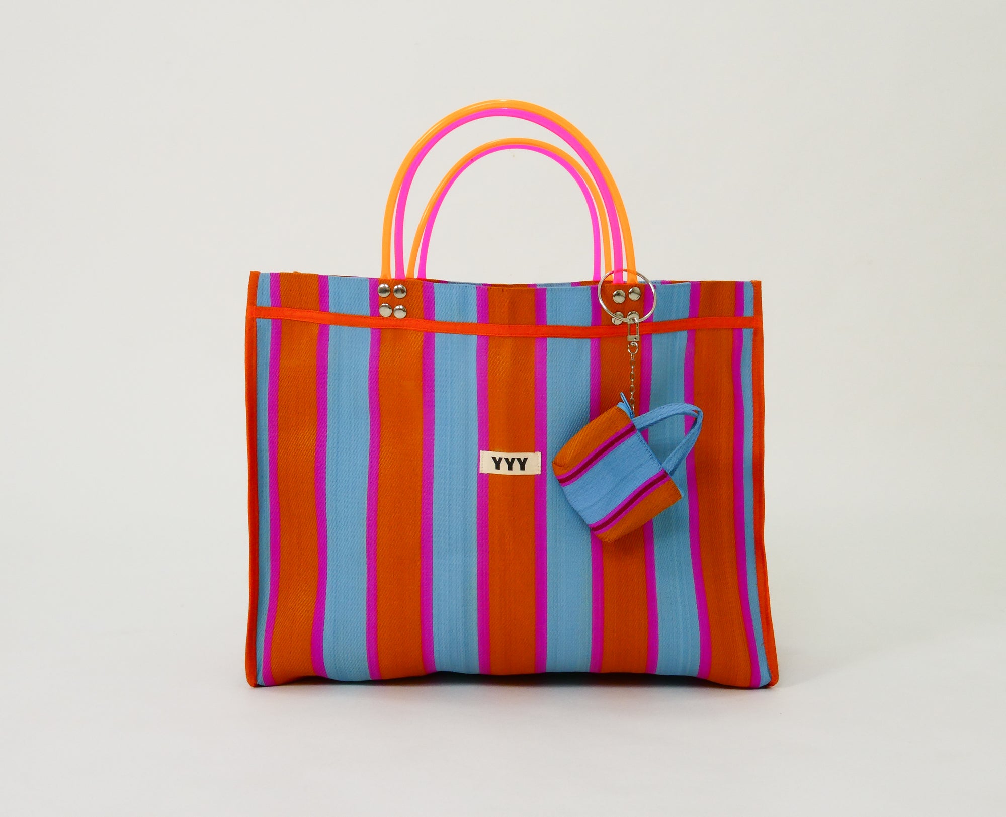 Colorful striped tote bag with matching strap 