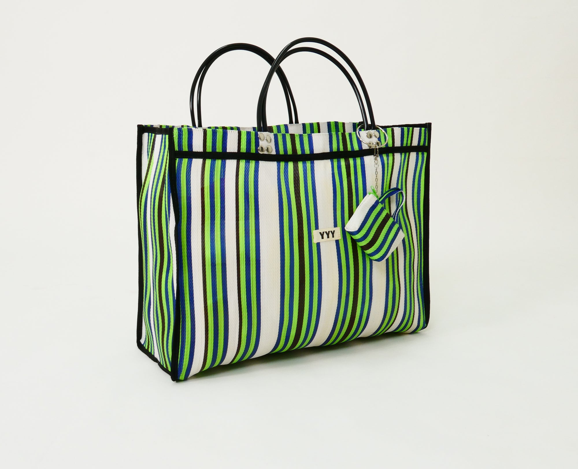 The Huge handmade tote bag made from 100% recycled plastic in green, white, and black stripes