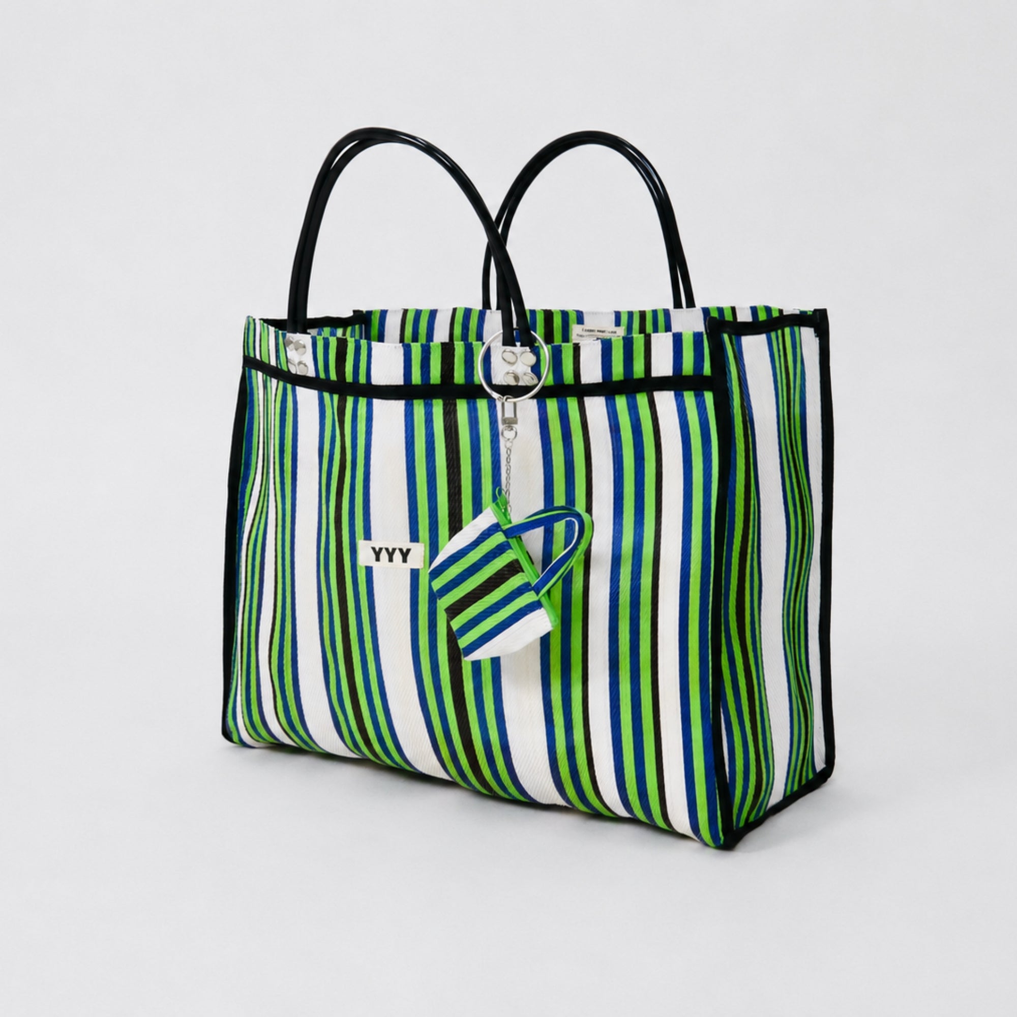 Striped tote bag with a small pouch attached. 