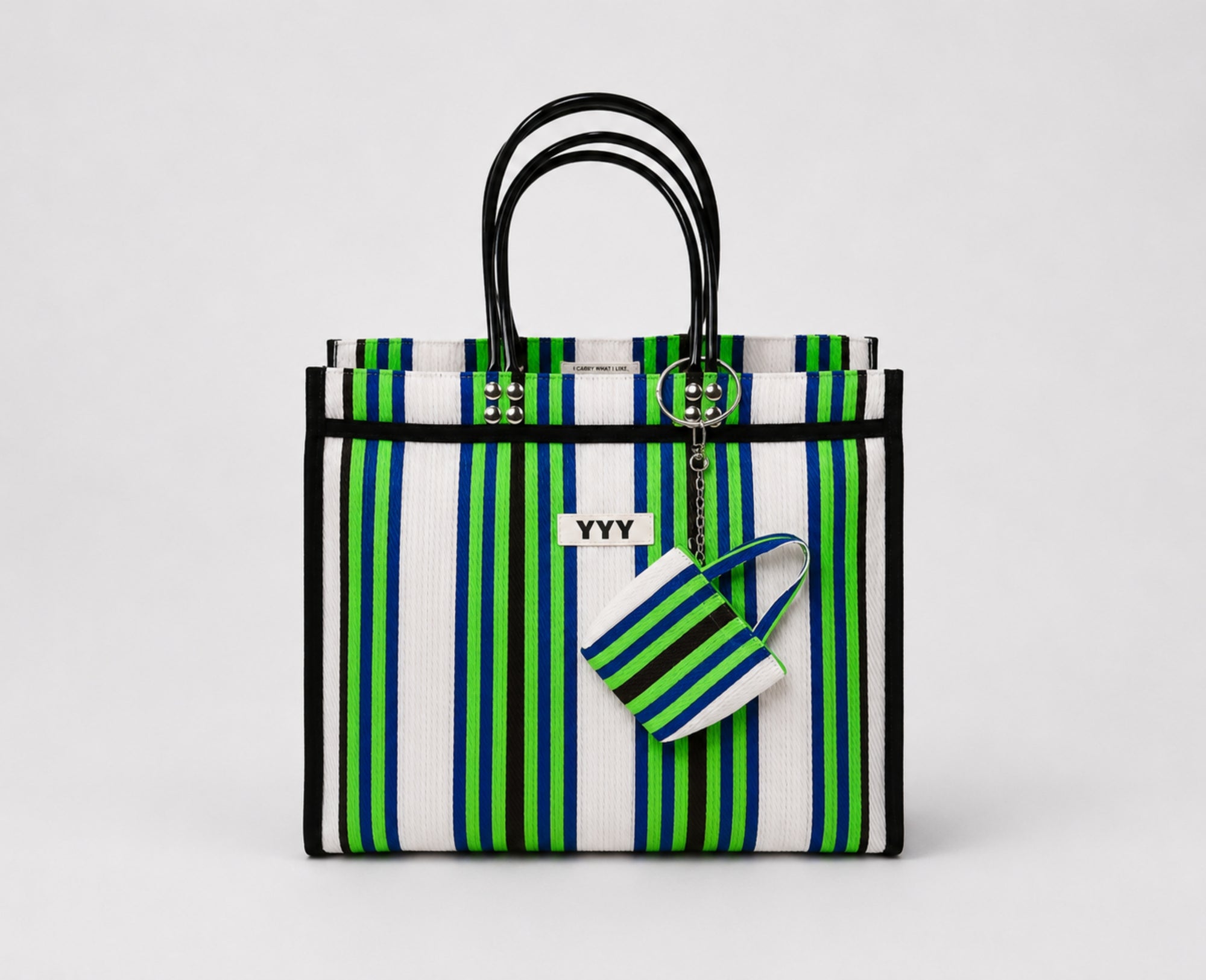 The Tote handmade bag in green and white stripes made from 100% recycled plastic