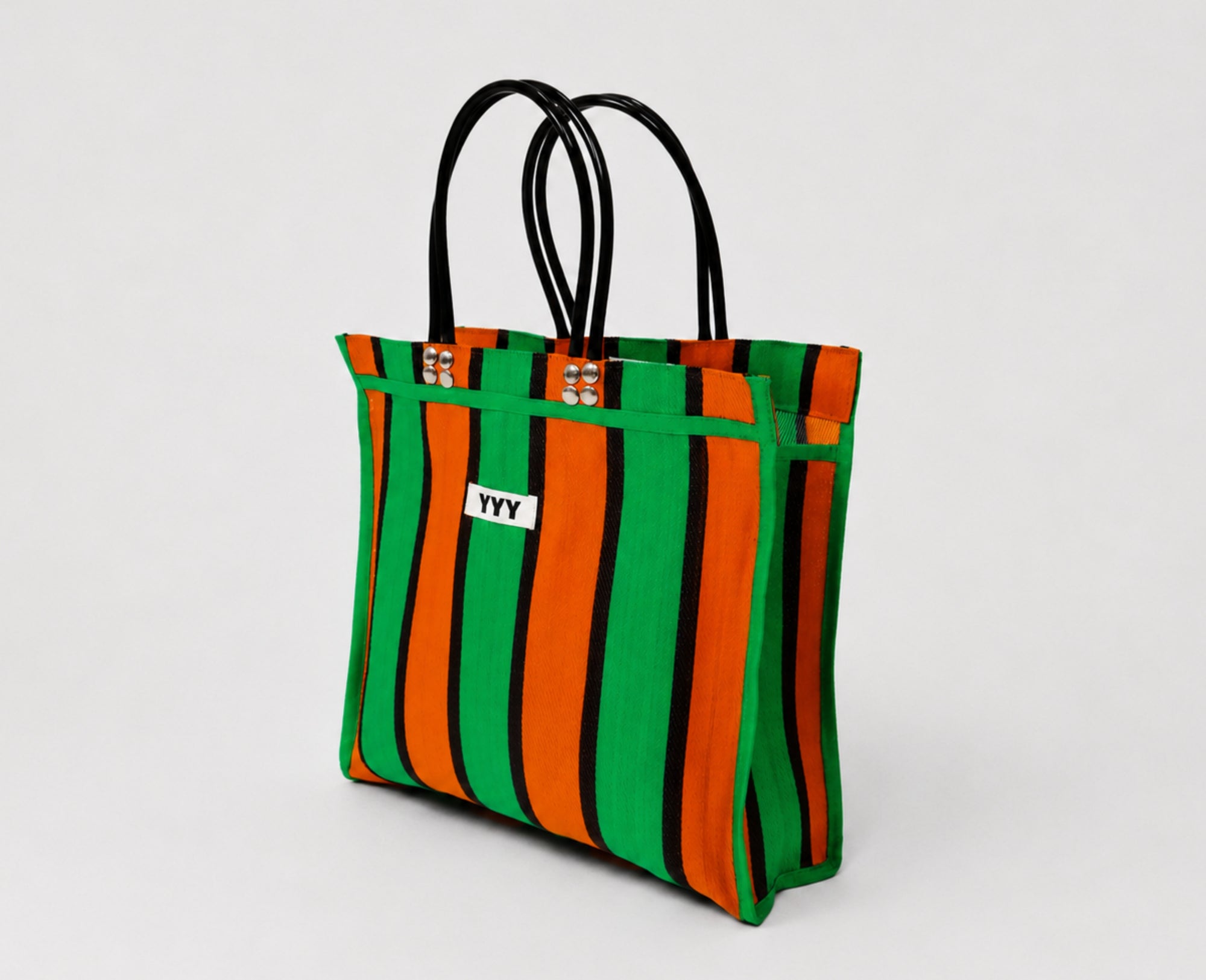 Orange striped tote bag crafted from 100% recycled plastic