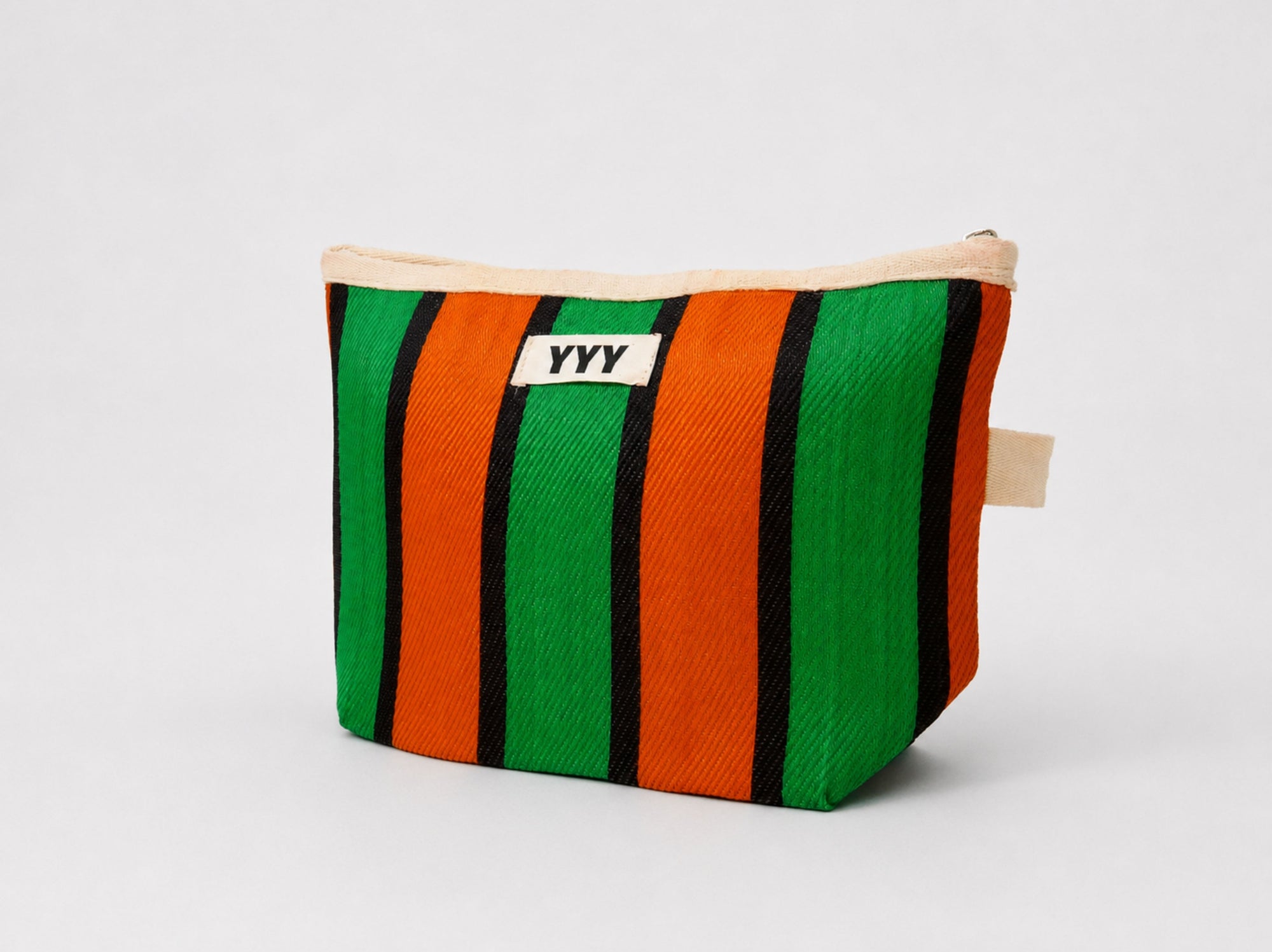 Front view of The Clutch Bag in orange and green stripes